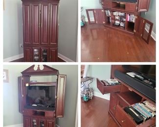 Entertainment center with shelves and cabinets  
82"H x39"W x20" D