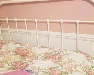 another metal bed with mattress