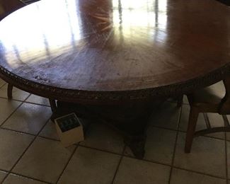 Large round dining table & chairs