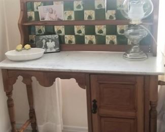 Rare antique washstand with tiled back splash