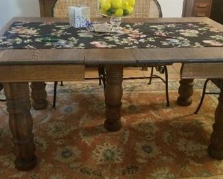 A close up of the Farmhouse table with two leaves 