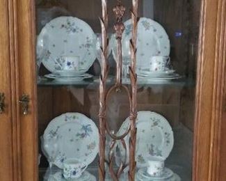 The carved middle section of the china hutch