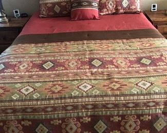 Queen bed in good condition with nice bed linens