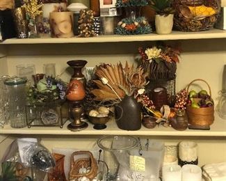 We have a large assortment of  candles and silk flowers for arranging 