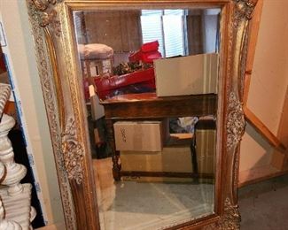 Giant, ornate framed mirror 