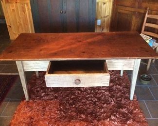 Antique farm table with two board top. Base has been scraped and top is older varnish 60”x32”x29” tall