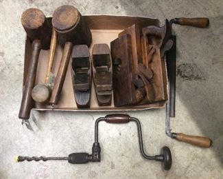 Antique carpenter tools, planes, drills, mallets