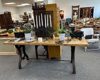 RARE LONG TABLE WITH INDUSTRIAL HEAVY IRON FOUNDRY BASE. GOTHIS WROUGHT IRON CANDELABRA, FRENCH PAIR OF MATCHING CAST IRON PLANTERS IN BLACK.GREAT LAGE ALOE PLANTERS