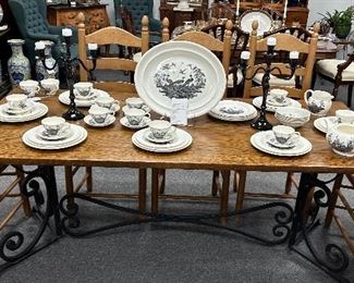 LONG SOLID ENGLISH THICK OAK HARVEST TABLE WITH HEAVY IRON BASE. SET OF 8 LADDERBACK CHAIRS, TABLE IF FEATURE WITH WEDGEWOOD CREAMWARE, LIVERPOOL BIRDS PATTERN, IN BLACK AND CREAM.