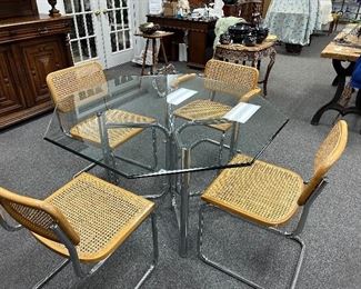 MID CENTURY HEXAGON GLASS TOP  TABLE WITH A GREAT CROME BASE, FEATURED WITH MARCEL BAUER SET OF 4 CHAIRS.