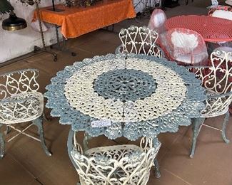 CAST IRON TABLE WITH OLD PAINT AND DARLING SET OF 4 CHAIRS THAT MATCH, PAINT COLOR WEDGEWOOD BLUE