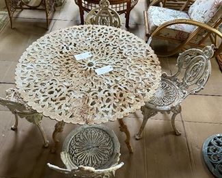 CAST IRON VICTORIAN TABLE WITH CAST IRON EARLY VICTORIAN GARDEN CHAIRS