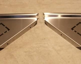 Stainless steel corner shelves.