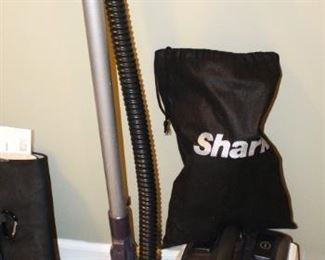 Shark vacuum with attachments.