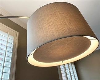 Arm extension floor lamp.