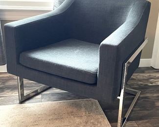 Chrome base upholstered chair.