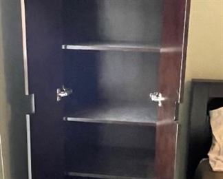 Previously pictured wardrobe with doors opened.