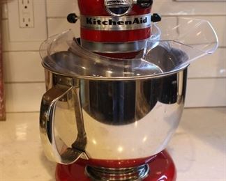 Red KitchenAid standing mixer.
