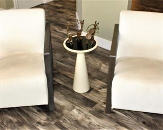 Pair of Mitchel Gold & Bob Williams chairs shown with pull up table by same designers.