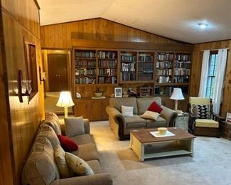 brand new living room suite as well as 400+ books including fiction, art, encyclopedias, nature and reference books.