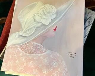 original painting of woman in a hat by homeowner