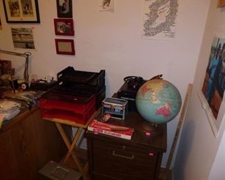 office items and a vintage globe