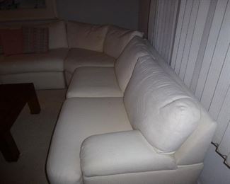 the other end of the large white sectional couch