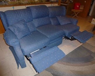 now reclining! This couch was used a lot  more then the other white couch in the living room could use a good cleaning.