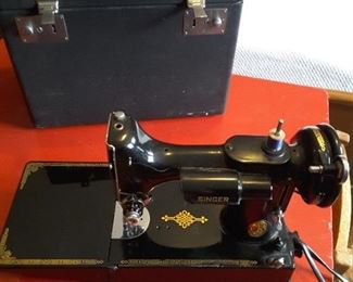 Antique Singer Featherweight sewing machine w/case.
