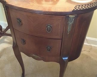 French commode chest mahogany with olive wood, tulip wood, and satin wood inlays. Circa early 1900s.