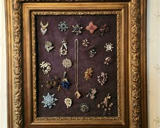 Antique framed costume jewelry