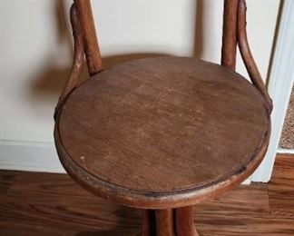 Primitive swivel stool