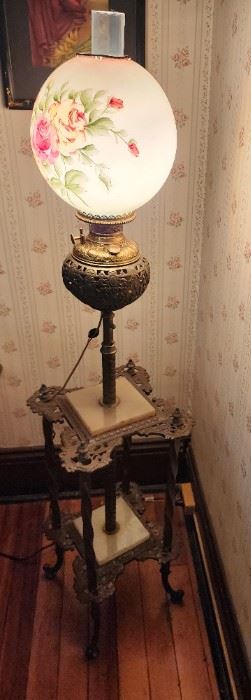 Electrified Oil lamp, with hand-painted globe with ornate metal base