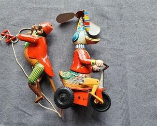 1960s tin Monkey ms218 toy and Vintage tin 482 mr duck on bike west Germany wind up toy