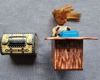 Captain Flint Treasure Island tin litho coin bank made in Japan and Miss Busy Bee The Typist Kanto toy wind up 1950s