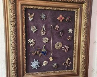Framed costume jewelry