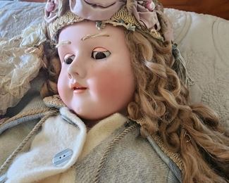 Antique Doll that belonged to the child of Paola's Lumber Mill Tycoon including her original clothes