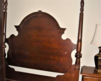 Queen mahogany four poster bed with rails.
