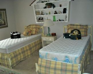 French Provencial bedroom suite by Dixie. Includes pair of twin beds w/matresses, triple dresser w/mirror, night stand and 4 drawer chest.
