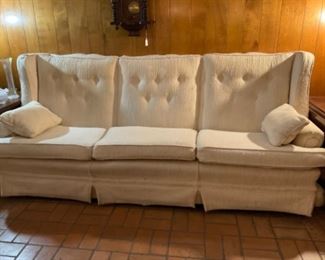 White three cushion sofa