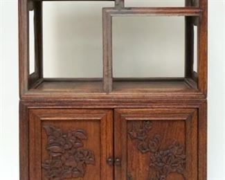 1010	CHINESE 2 PART MINIATURE WOOD TABLE TOP CABINET W/CARVED PANELED DOORS, APPROXIMATELY 12 IN X 6 IN X 28 1/4 IN HIGH
