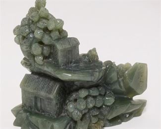 1020	JADE CARVING OF HUTS ON MOUNTAIN SIDE, CHARACTER SIGNED, APPROXIMATELY 7 IN X 6 1/4 IN HIGH
