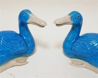 1030	PAIR OF BLUE & WHITE POTTERY DUCKS
