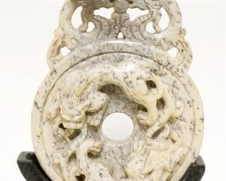 1045	INTRICATE CARVED ASIAN STONE IN CARVED STONE BASE, APPROXIMATELY 10 IN HIGH
