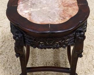 1062	ASIAN INSET MARBLE TOP CARVED WOOD TABLE, APPROXIMATELY 18 I X 18 IN HIGH
