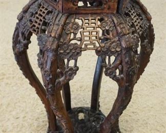 1082	ORNATE CARVED FRETWORK ASIAN STAND, APPROXIMATELY 15 IN WIDE X 17 IN DEEP X 32 IN HIGH
