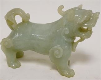1092	CARVED JADE FOO DOG, APPROXIMATELY 5 IN X 4 IN HIGH
