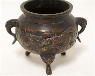 1122	BRONZE ASIAN POT W/ELEPHANT TRUNK HANDLES, APPROXIMATELY 3 1/2 IN HIGH
