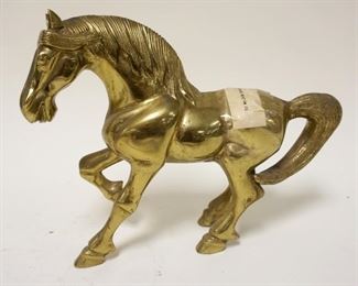 1132	SOLID BRASS HORSE, APPROXIMATELY 9 IN HIGH
