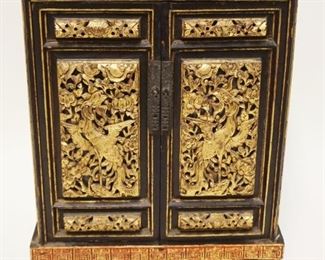 1141	ANTIQUE ASIAN GILT DECORATED WOOD CARVED CABINET, 2 DOOR IN DOVETAILED CASE, APPROXIMATELY 5 IN X 11 1/4 IN X 17 IN HIGH
